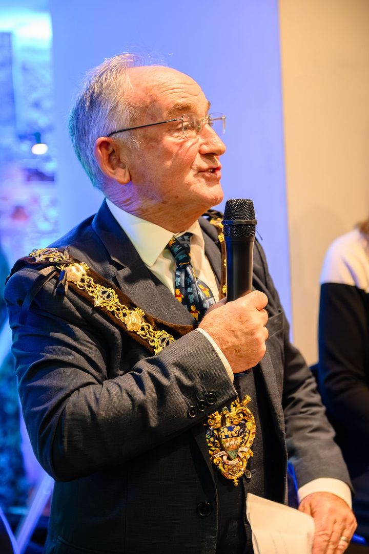 The Mayor of Wirral in his chain of office speaking at the unveiling.